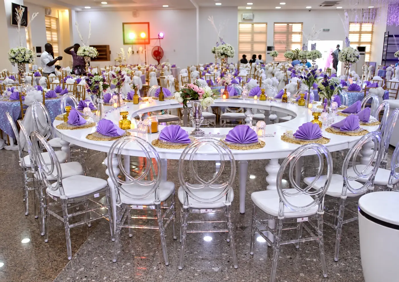 Lavender and white dining arrangement at Admiralty Conference Centre, Victoria Island