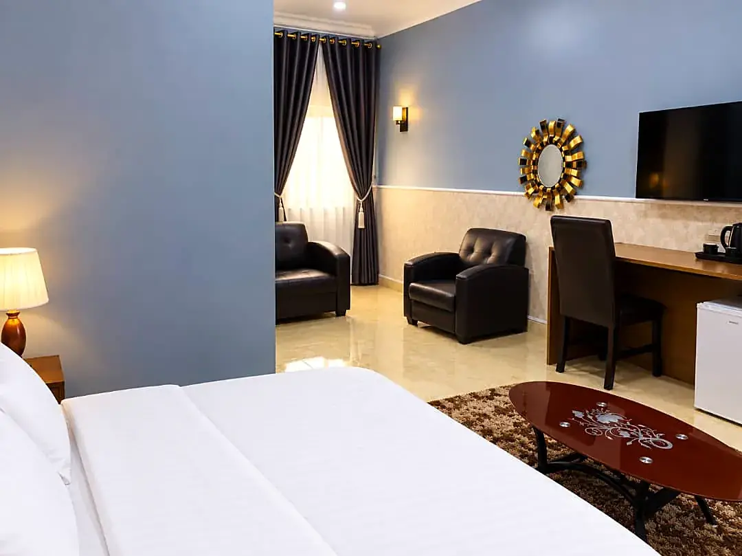 Deluxe Room: bedroom and mini parlour at the Kaduna guest house